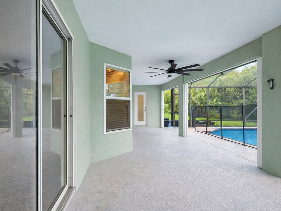 Covered lanai overlooking swimming pool